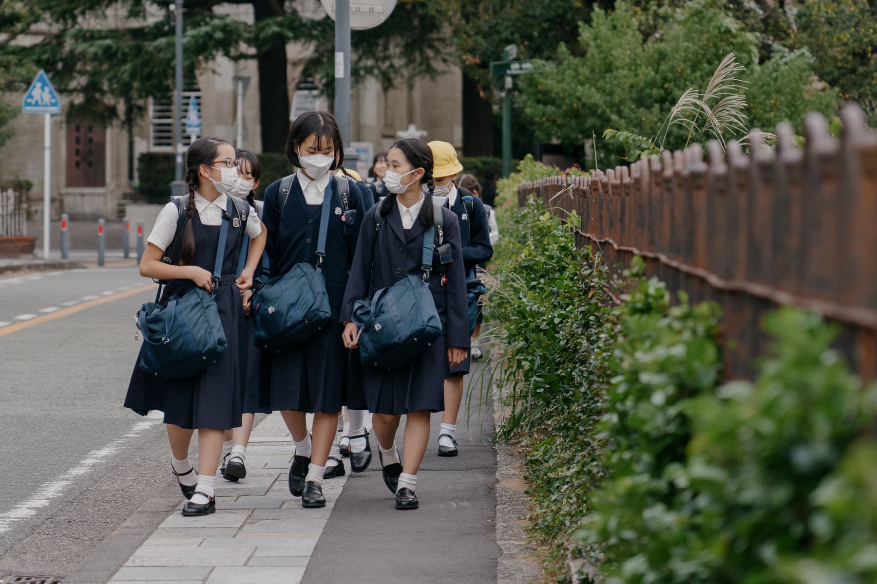 Students in uniform in Yokohama. Most middle schools and high schools have strict policies regarding clothing and appearance. In recent years, some policies such as designated underwear color, hairstyles, and dyeing naturally brown hair black have come under question.