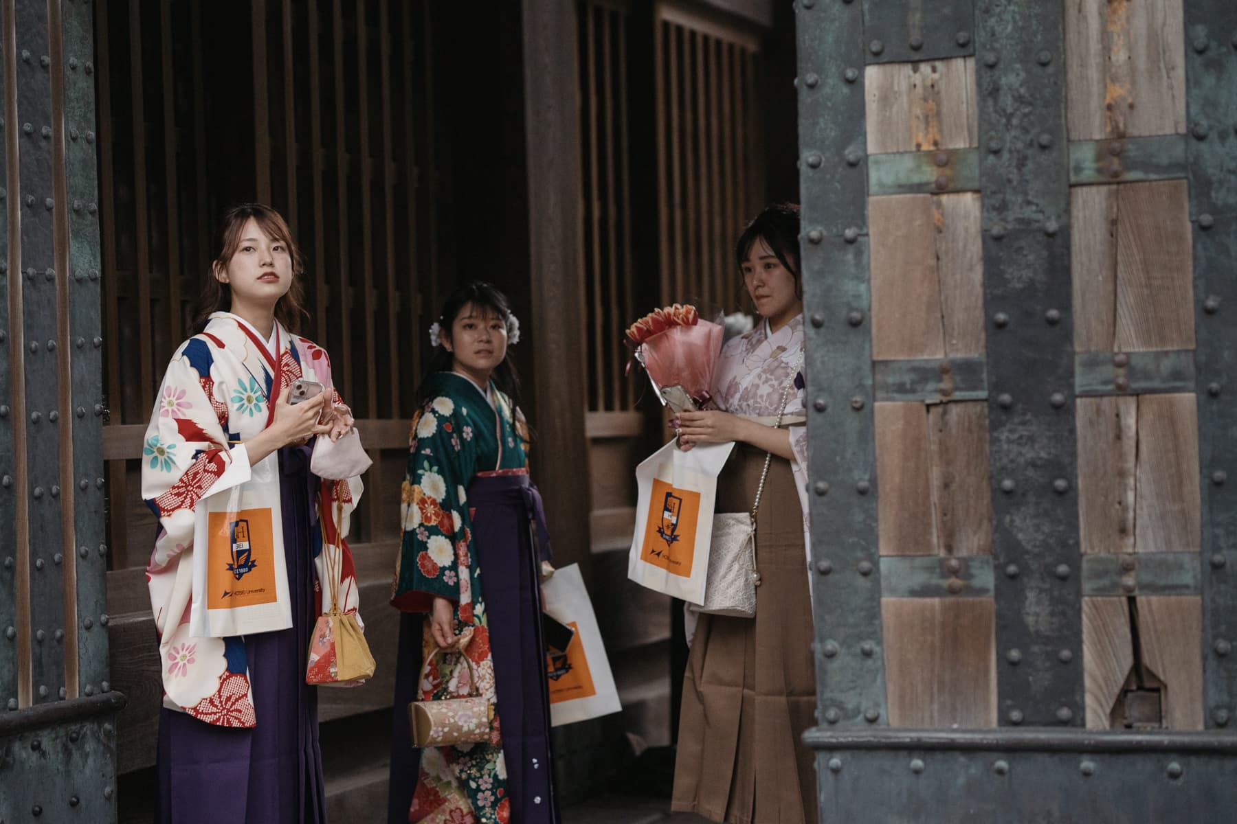 Young women in <i>kimono</i> at their university graduation. Young adults often feel more freedom of self-expression in university, but quickly come up against strong societal expectations when looking for employment. 